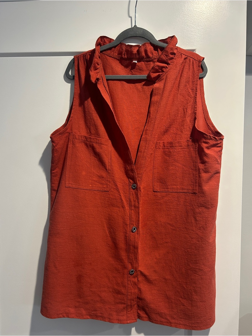 Cotton blend blouse in burnt amber color.